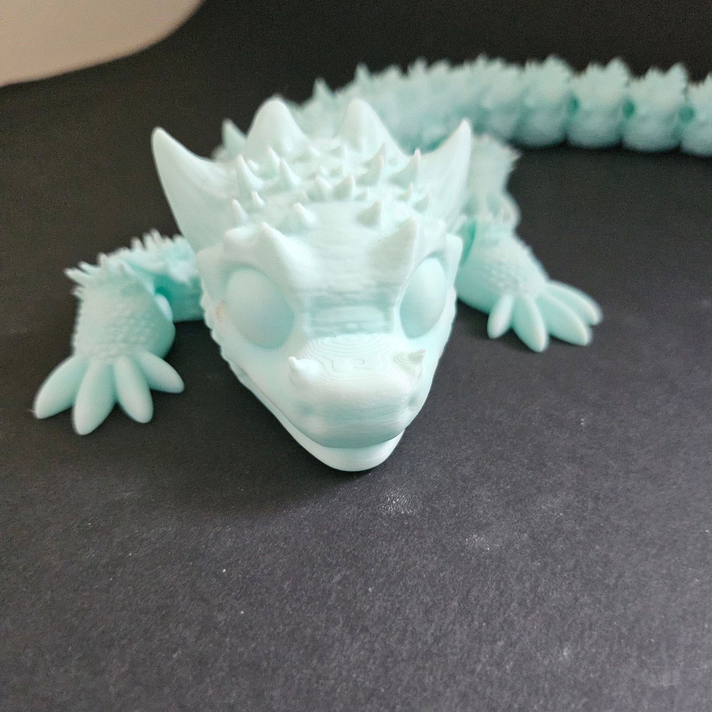 Dragon flexibil și articulat de 1 metru cu gradient albastru