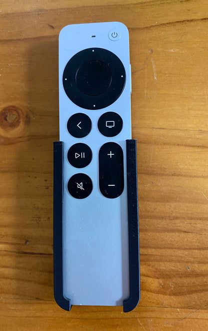 Suport de perete pentru Apple TV 4K și telecomandă, design modern și compact