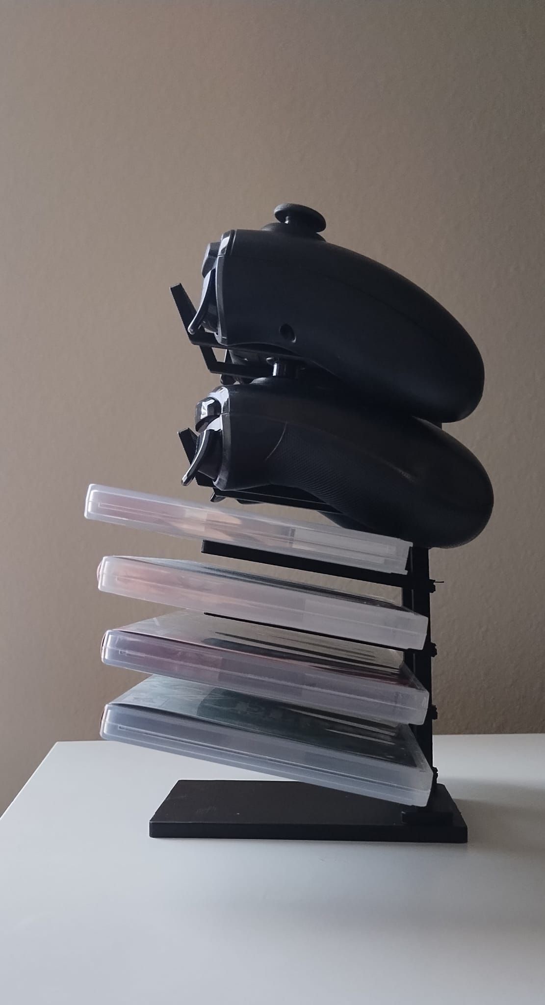 Suport vertical pentru gamepaduri și carcase de jocuri gamestation rack