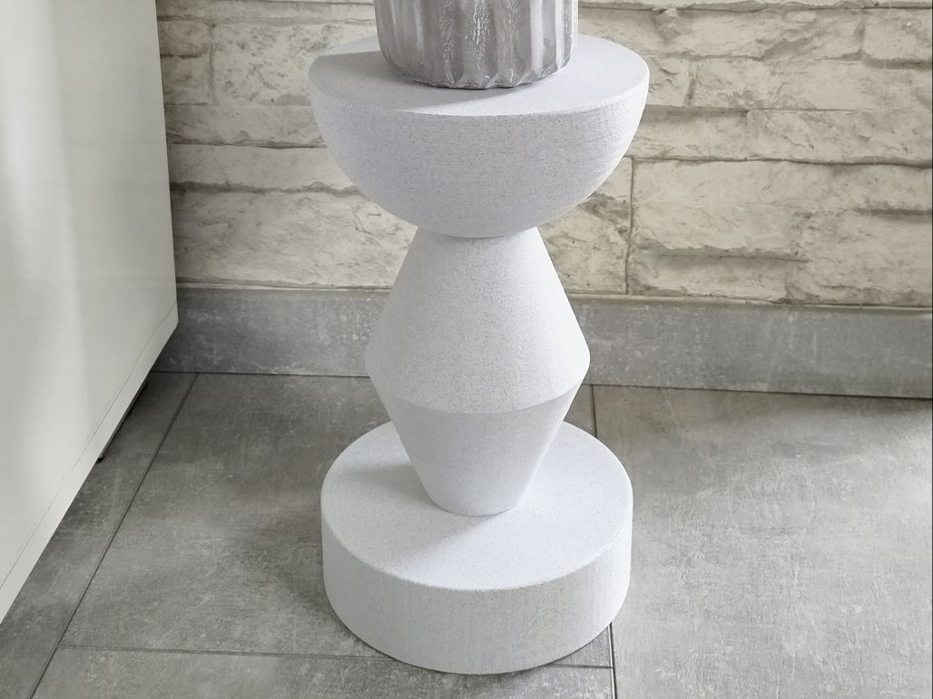 Masuta laterala sculpturala minimalista